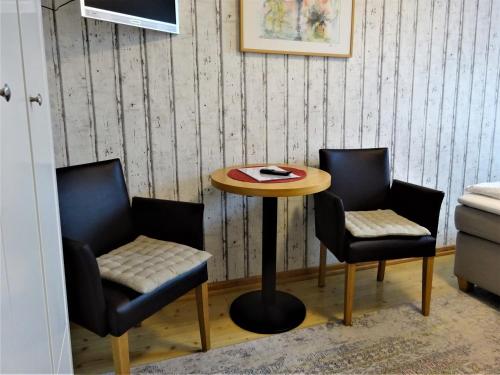 Uma área de estar em Hotel Pension Zur Fährbrücke