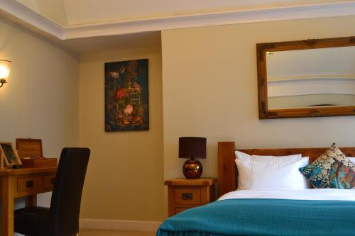 Letto o letti in una camera di The Angel Posting House & Livery