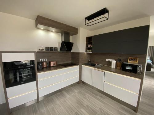 Η κουζίνα ή μικρή κουζίνα στο GNG Apartment