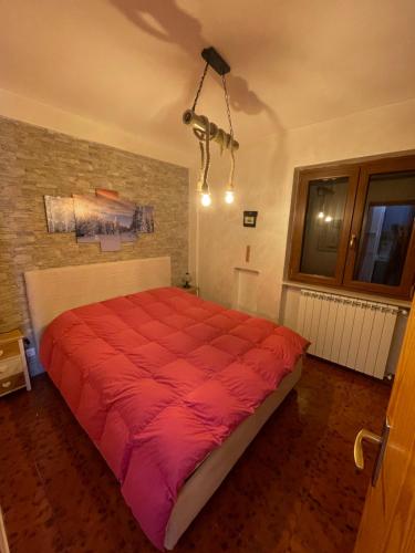מיטה או מיטות בחדר ב-Appartamento in residence Ovindoli