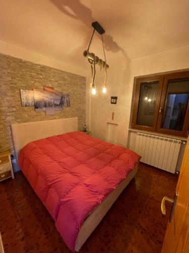 Postel nebo postele na pokoji v ubytování Appartamento in residence Ovindoli