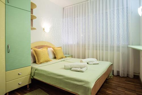 Ένα ή περισσότερα κρεβάτια σε δωμάτιο στο Apartment Emilija