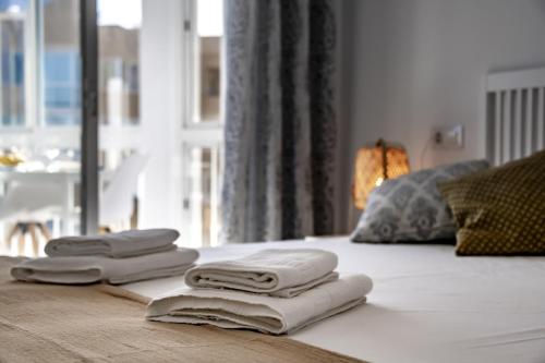 A bed or beds in a room at Villas Guzman - Molinet
