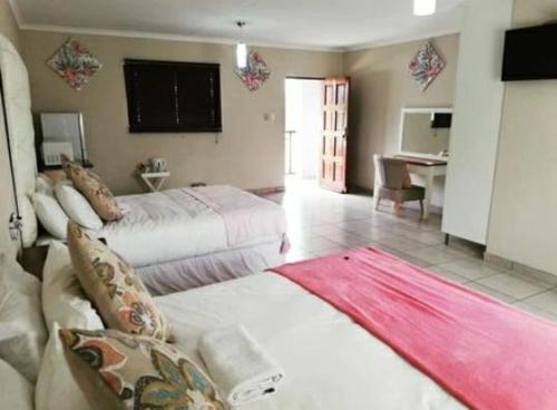 Zamambongi Guest Houses & Spaにあるベッド