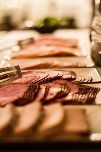 a close up of some food on a table at Mayfair Hotel Tunneln in Malmö