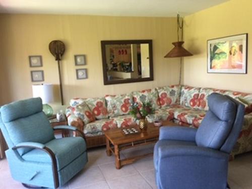 a living room with a couch and two chairs at 9B EKAHI VILLAGE-STUDIO BATH, GARDEN VIEW - 1 MINUTE STROLL to BEACH! in Wailea