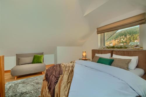 Posteľ alebo postele v izbe v ubytovaní Apartament Royal Szczyrk