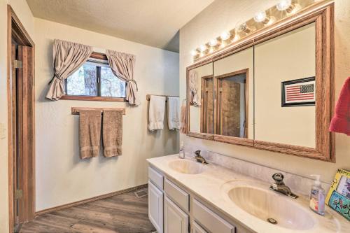 A bathroom at Munds Park Cabin with Fire Pit and Wraparound Porch!