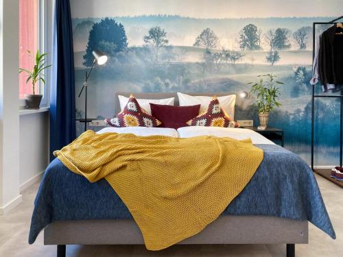 Ένα ή περισσότερα κρεβάτια σε δωμάτιο στο Astoria Apartments