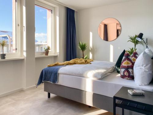 Ένα ή περισσότερα κρεβάτια σε δωμάτιο στο Astoria Apartments