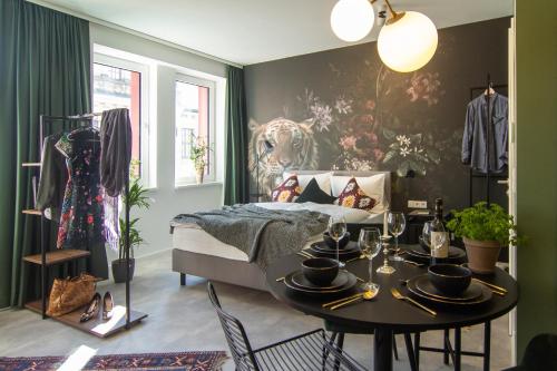 Ένα ή περισσότερα κρεβάτια σε δωμάτιο στο Astoria Apartments