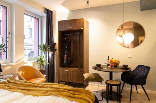 Ένα ή περισσότερα κρεβάτια σε δωμάτιο στο Astoria Apartments