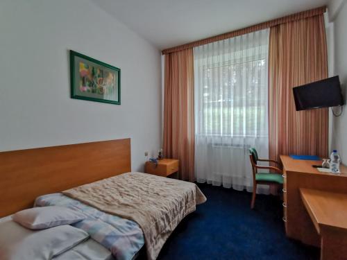 Posteľ alebo postele v izbe v ubytovaní Geovita Wisła