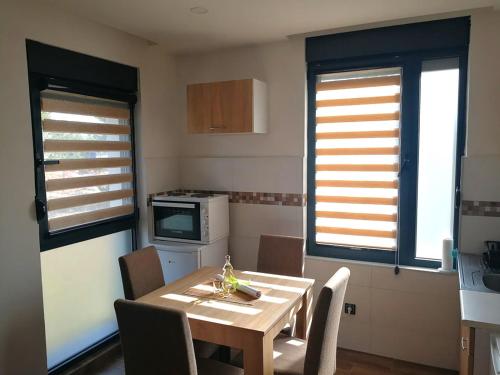Kuchyň nebo kuchyňský kout v ubytování Apartman NINA Bombonjera