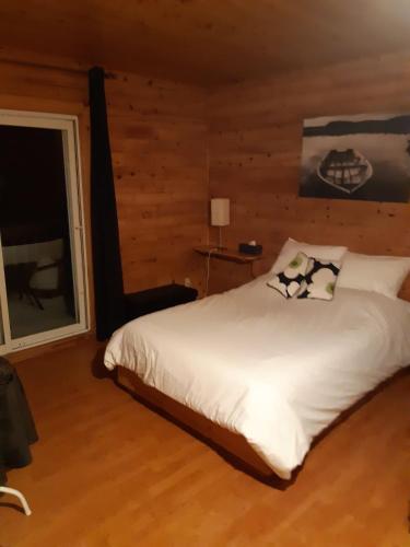Ένα ή περισσότερα κρεβάτια σε δωμάτιο στο Auberge Ma Maison