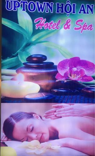 a poster of a young boy sleeping in a hot spa at Uptown Hoi An Hotel & Spa in Hoi An