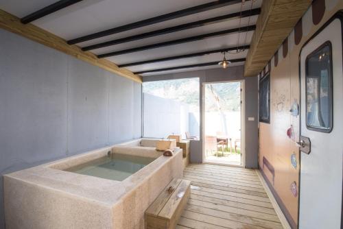 Fotografie z fotogalerie ubytování Mountain Moon Hot Spring Camp Site v destinaci Liugui