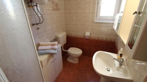 Koupelna v ubytování Apartments Grahovac