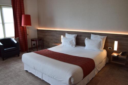 Hotel Restaurant Weinebruggeにあるベッド