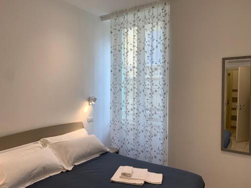 Postel nebo postele na pokoji v ubytování Affittacamere Sapore di Mare