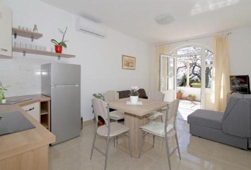 Kuchyňa alebo kuchynka v ubytovaní Apartments M&P