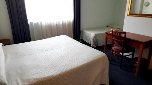 Hotel Tortorinaにあるベッド