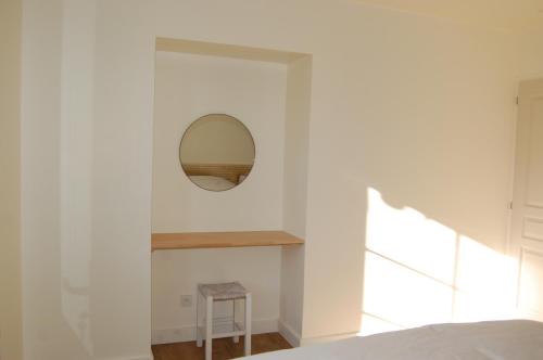 Postel nebo postele na pokoji v ubytování Gîte de l'Échaudi