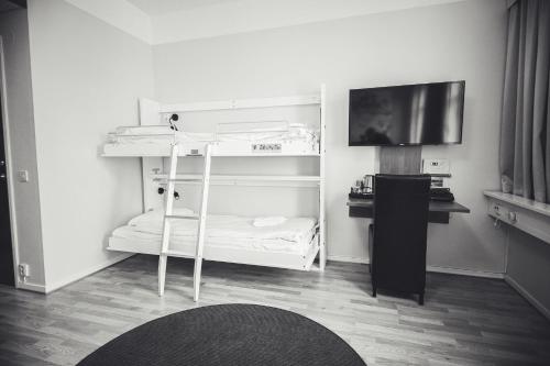 Best Western Hotel Statt Katrineholmにあるベッド