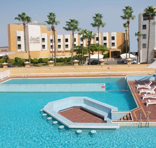 Πισίνα στο ή κοντά στο The Apartments
