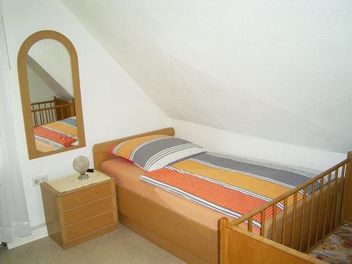 Postel nebo postele na pokoji v ubytování Ferienhaus und Ferienwohnung Knappstein