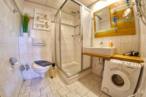 Ein Badezimmer in der Unterkunft Meerforelle 207 - Villa Seeblick