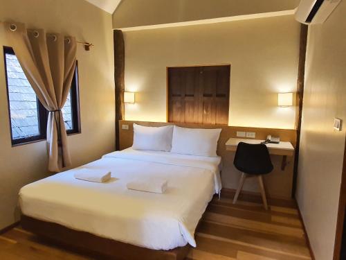 Postel nebo postele na pokoji v ubytování PAN KLED VILLA eco hill resort