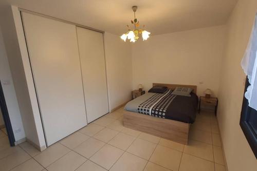 Krevet ili kreveti u jedinici u objektu Appartement tout confort au milieu de la Margeride