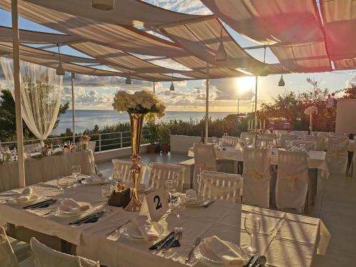 a table set up for a wedding with a view at Stella Mare Eco Boutique House in Zavala