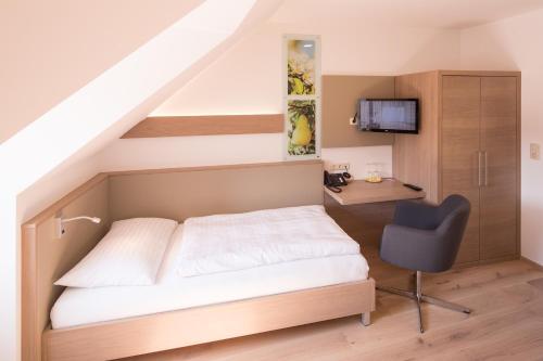 Postel nebo postele na pokoji v ubytování Hotel Stadt Melk