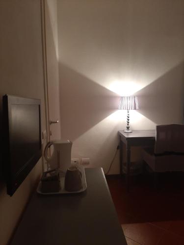 TV a/nebo společenská místnost v ubytování B&B Principe Calaf 3