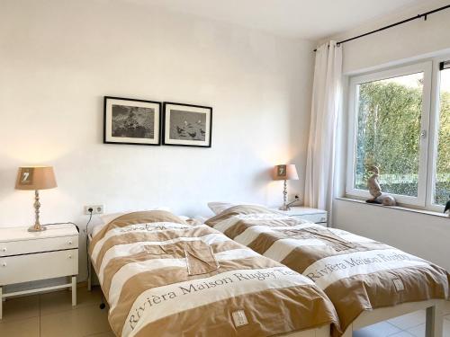 Postel nebo postele na pokoji v ubytování Luxe Vakantiehuis Oostkapelle OK32