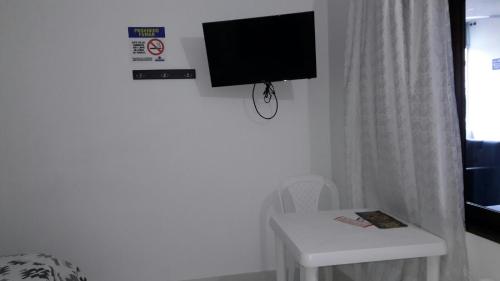 TV a/nebo společenská místnost v ubytování HOTEL TANIA