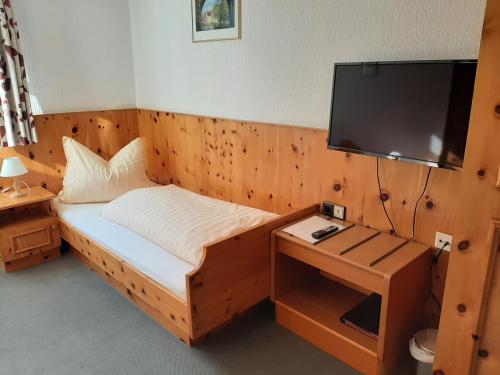 Ένα ή περισσότερα κρεβάτια σε δωμάτιο στο Altstadthotel garni Frankfurter Hof