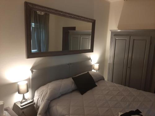 Postel nebo postele na pokoji v ubytování B&B Principe Calaf 3