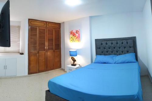 A bed or beds in a room at Oferta frente a la playa Cartagena . En, Sp, It.