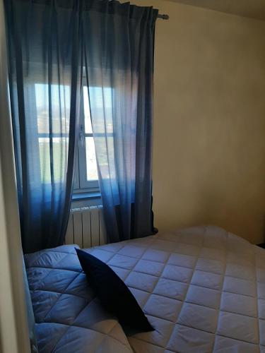 Postel nebo postele na pokoji v ubytování B&B Principe Calaf 3