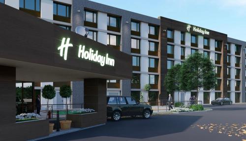 a rendering of a hotel with a car parked in front at Holiday Inn Chicago Midway Airport S, an IHG hotel in Chicago