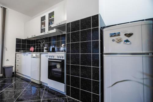 Kjøkken eller kjøkkenkrok på Apartman ISKRA