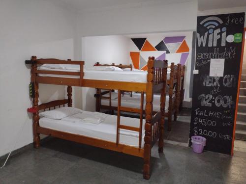 a group of bunk beds in a room at COACHHOSTEL7 in São Paulo