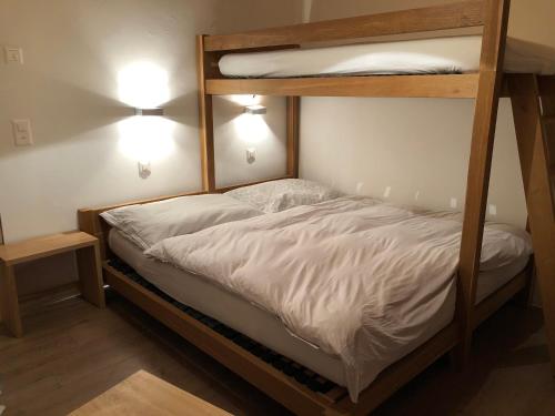 Poschodová posteľ alebo postele v izbe v ubytovaní Perle des Alpes, Bettmeralp, Switzerland
