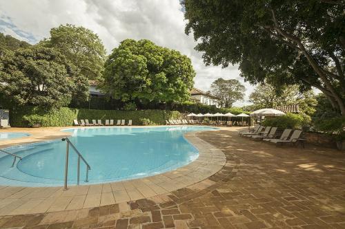 A piscina localizada em Hotel Fazenda Dona Carolina ou nos arredores