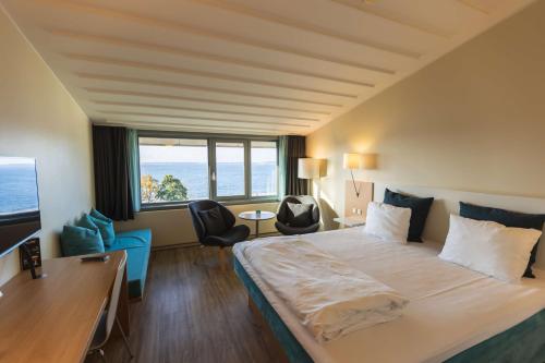 Un ou plusieurs lits dans un hébergement de l'établissement Hotel Sonderborg Strand
