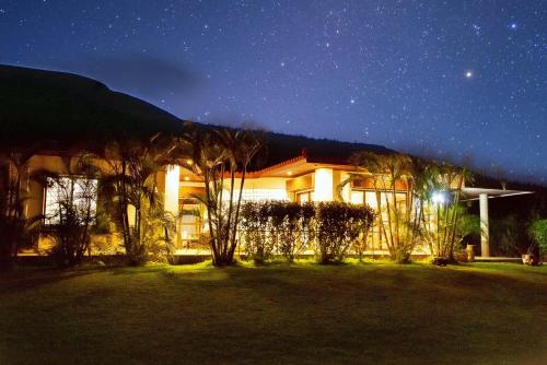 a house at night with a starry sky at Palm Villa Ishigakijima yugafu in Ishigaki Island