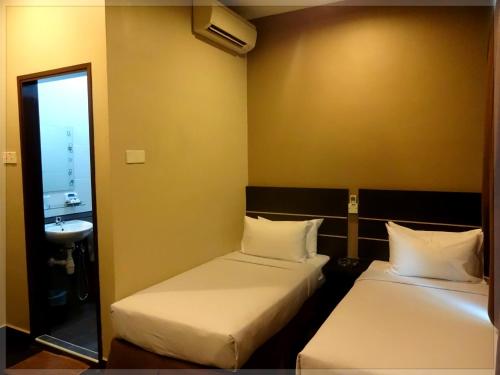 Cama o camas de una habitación en GoodHope Hotel, Kelana Mall